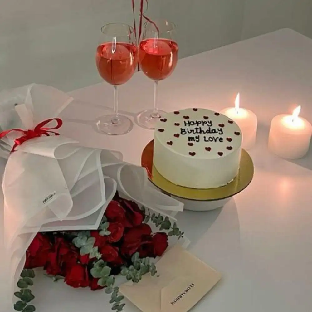 Happy birthday wishes simple text for a romantic partner with roses, candles, a birthday cake, and a love card.