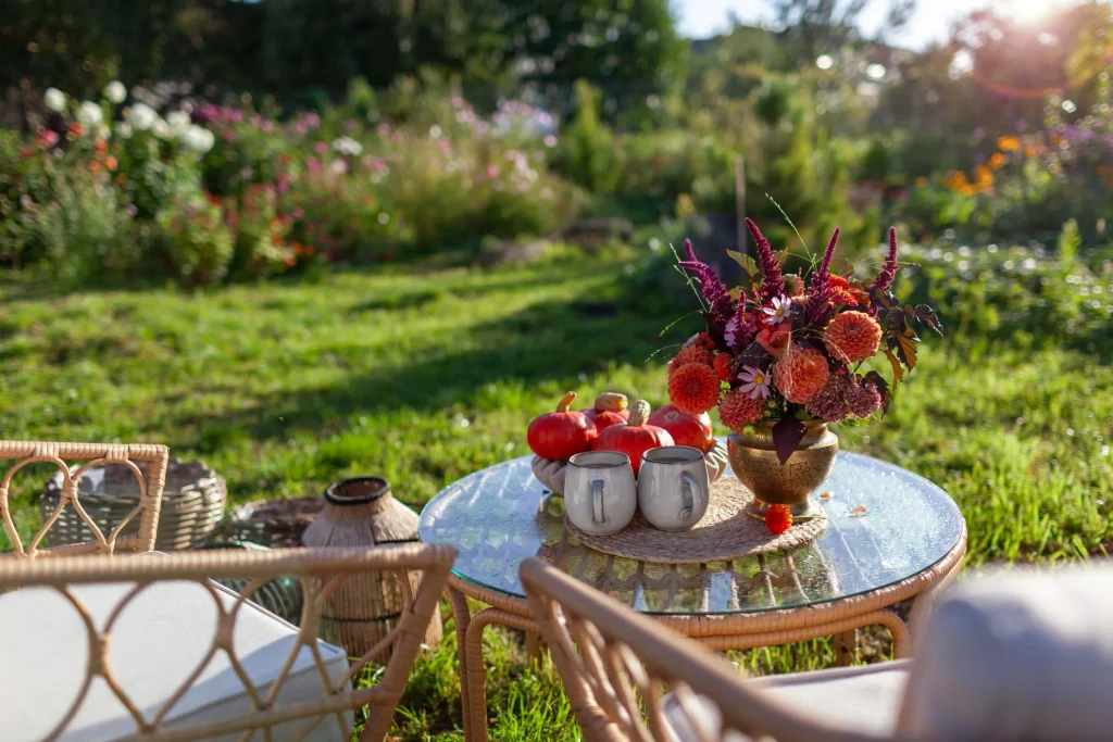 Happy October Blessings with joyful morning coffee, autumn flowers, pumpkins, and a beautiful sunrise.