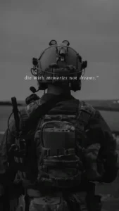 Inspirational army quotes featuring a determined soldier standing at sunrise